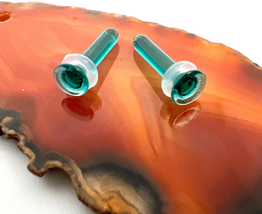 Aqua blue hand blown glass plugs. Fantastic starter pieces for your ear stretching journey!