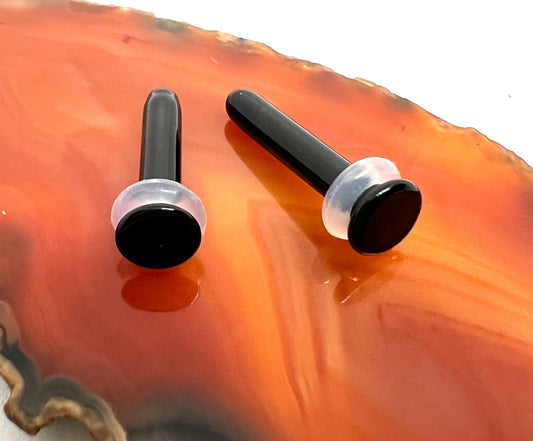 Black hand blown glass plugs. Fantastic starter pieces for your ear stretching journey!
