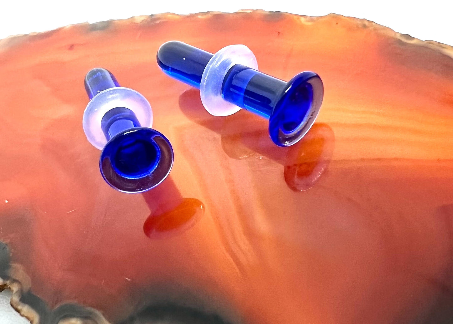 Dark blue hand blown glass plugs. Fantastic starter pieces for your ear stretching journey!